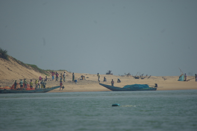 image of boats on sand bar