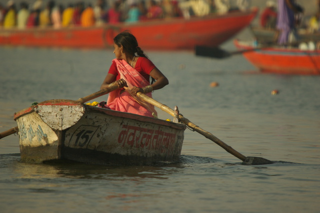 image of woman in row boat